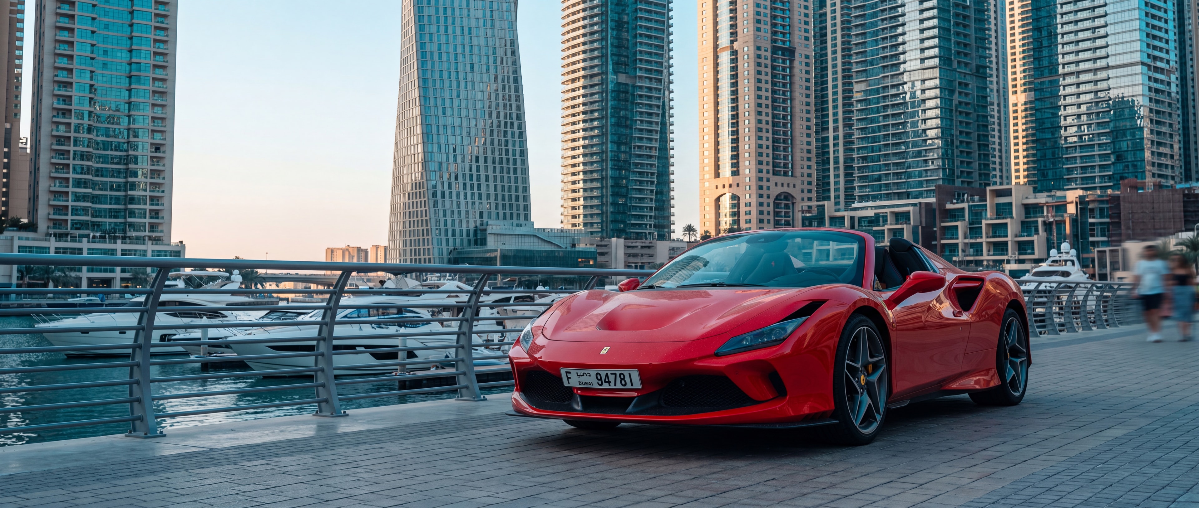 Ferrari F8 Tributo Spyder, 3/4 front, Dubai Marina golden hour