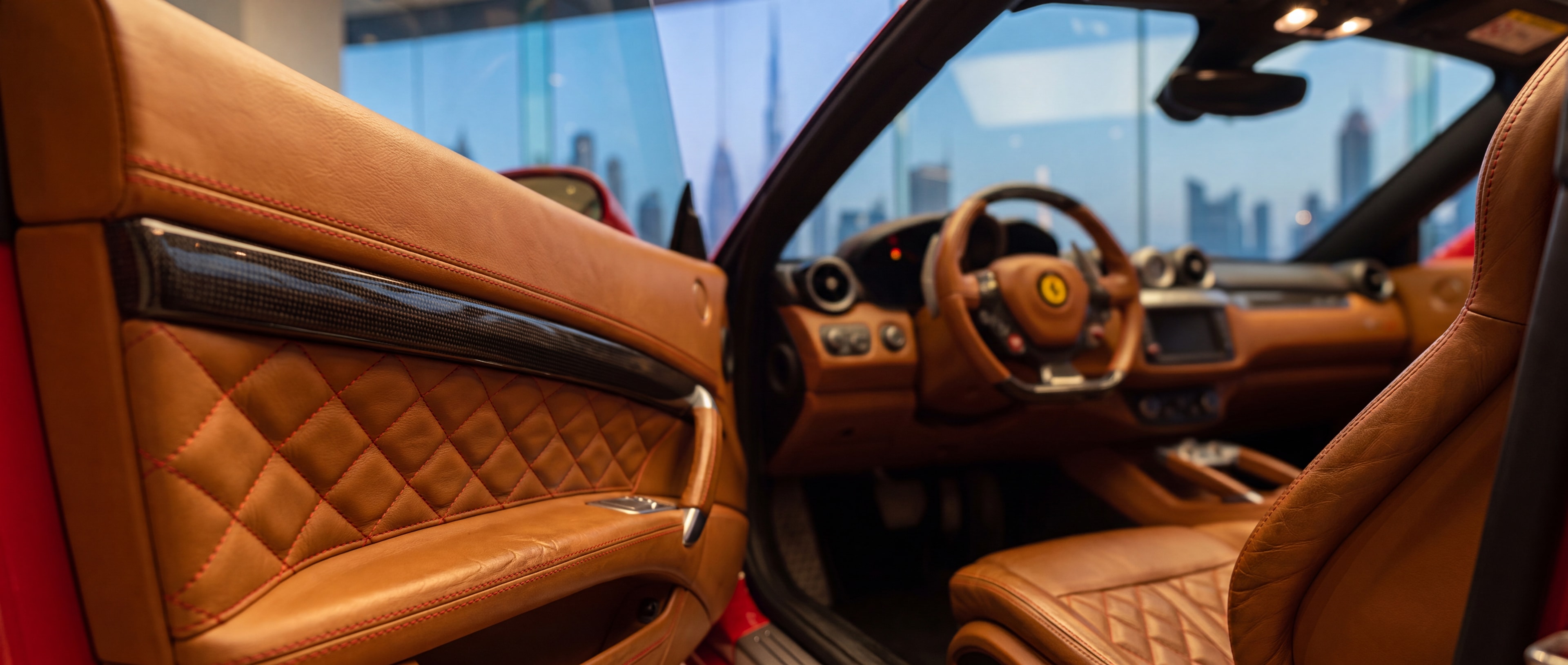 Ferrari Portofino cognac leather door trim and seat stitching detail, Downtown Dubai showroom