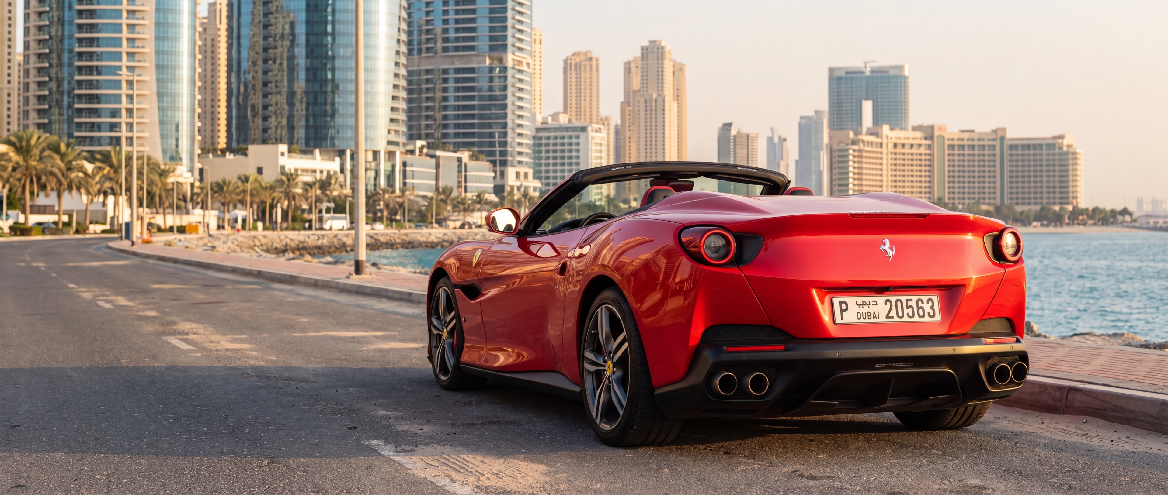 Ferrari Portofino, roof down, rear 3/4, Jumeirah Beach Road