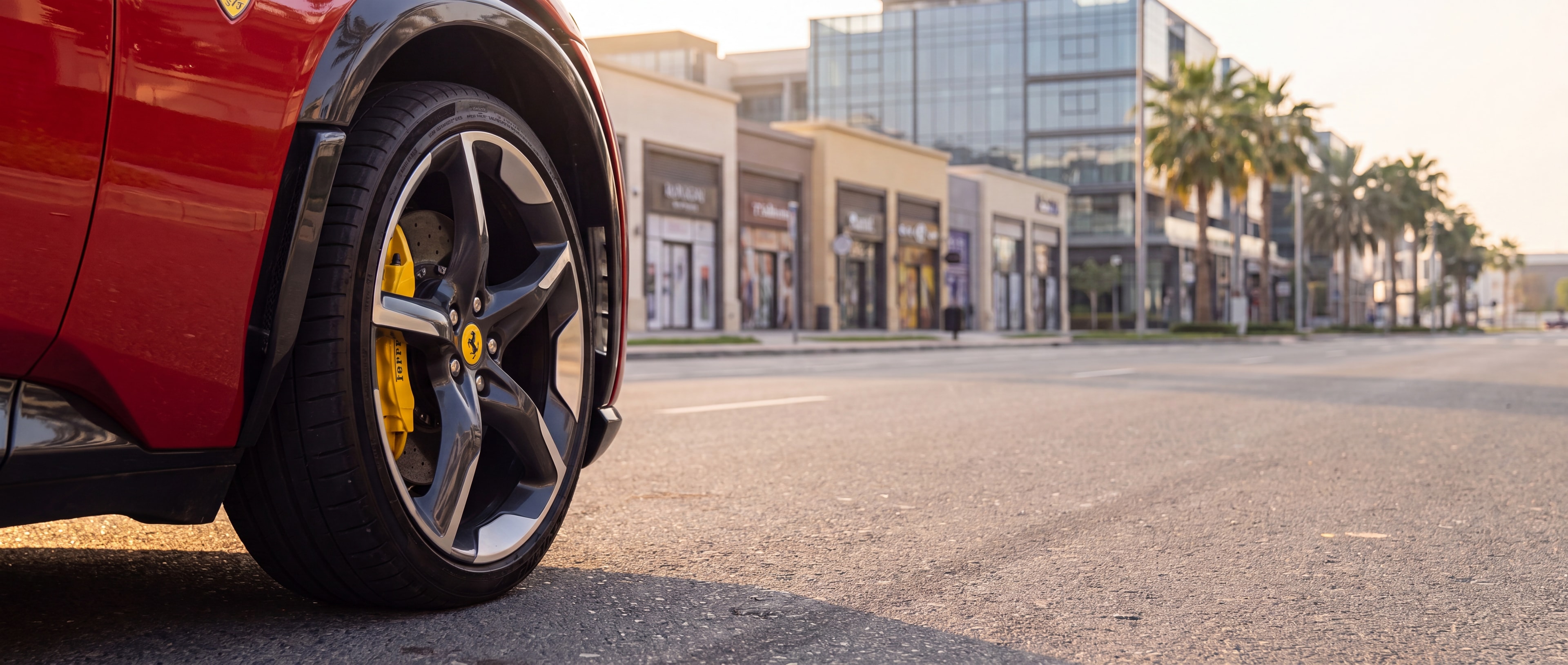 Ferrari Purosangue wheel and brake caliper detail, City Walk Dubai backdrop